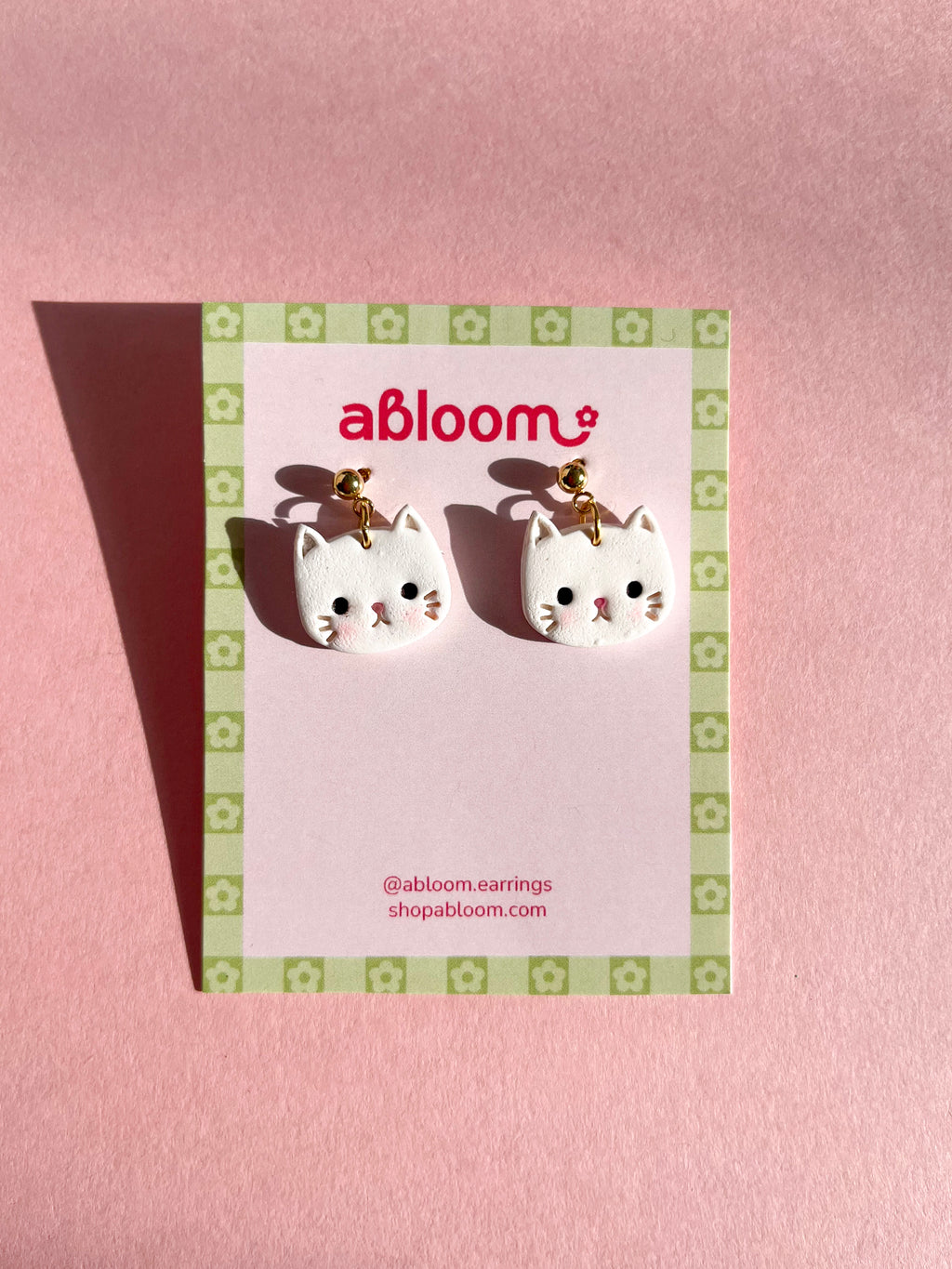 Cute handmade kitty earrings made from polymer clay