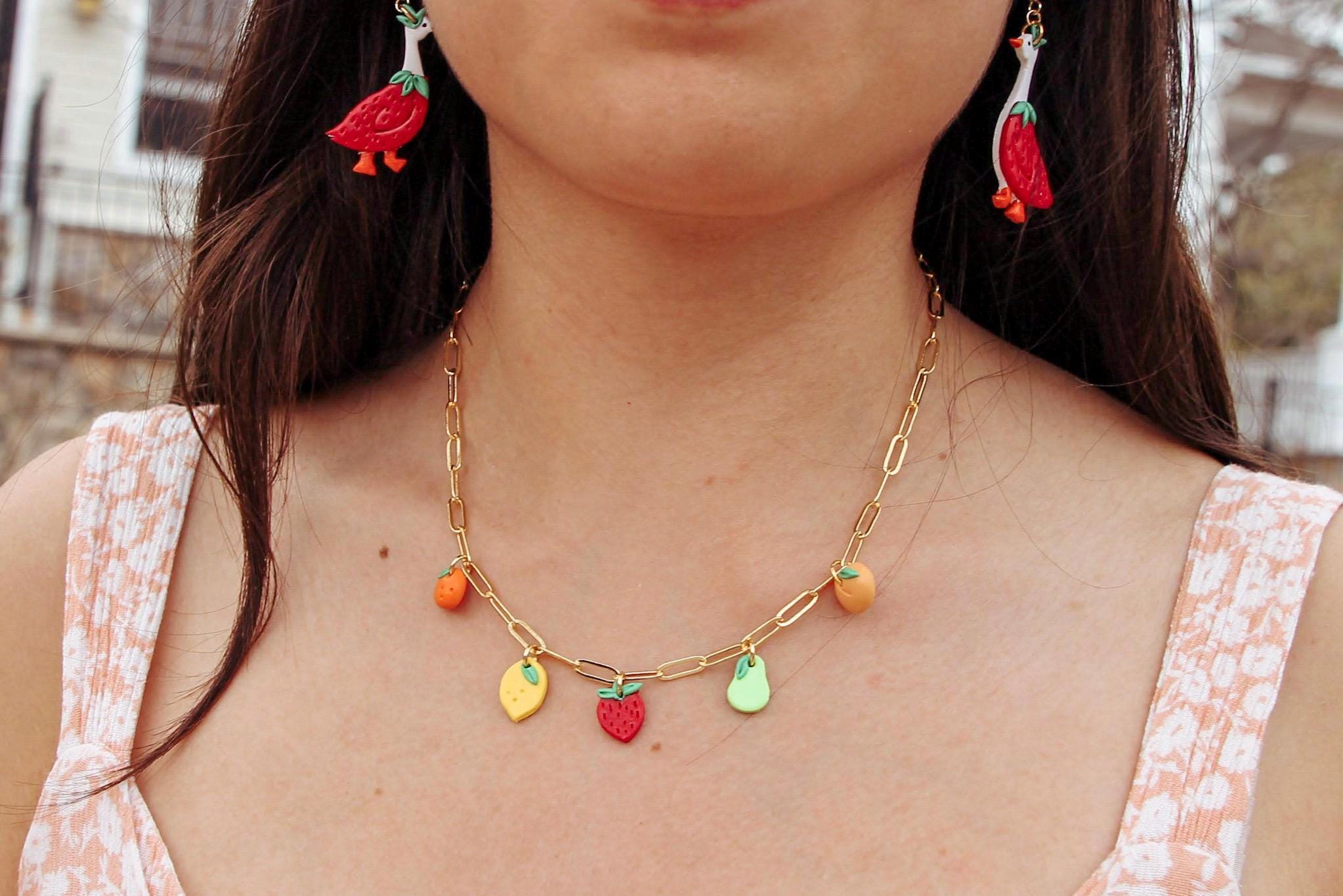 Necklace with colorful fruit-shaped clay charm pendants