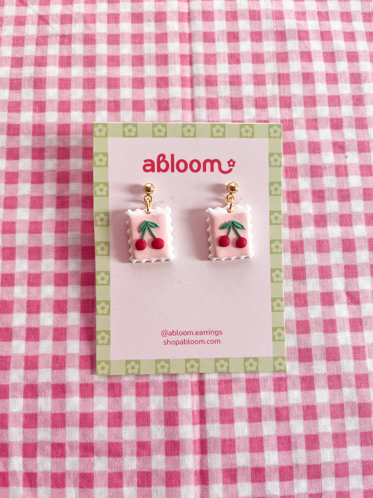 Cute whimsical fruit postage stamp earrings handmade from polymer clay