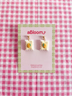 Cute whimsical fruit postage stamp earrings handmade from polymer clay