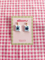 Cute whimsical fruit postage stamp earrings handmade from polymer clay