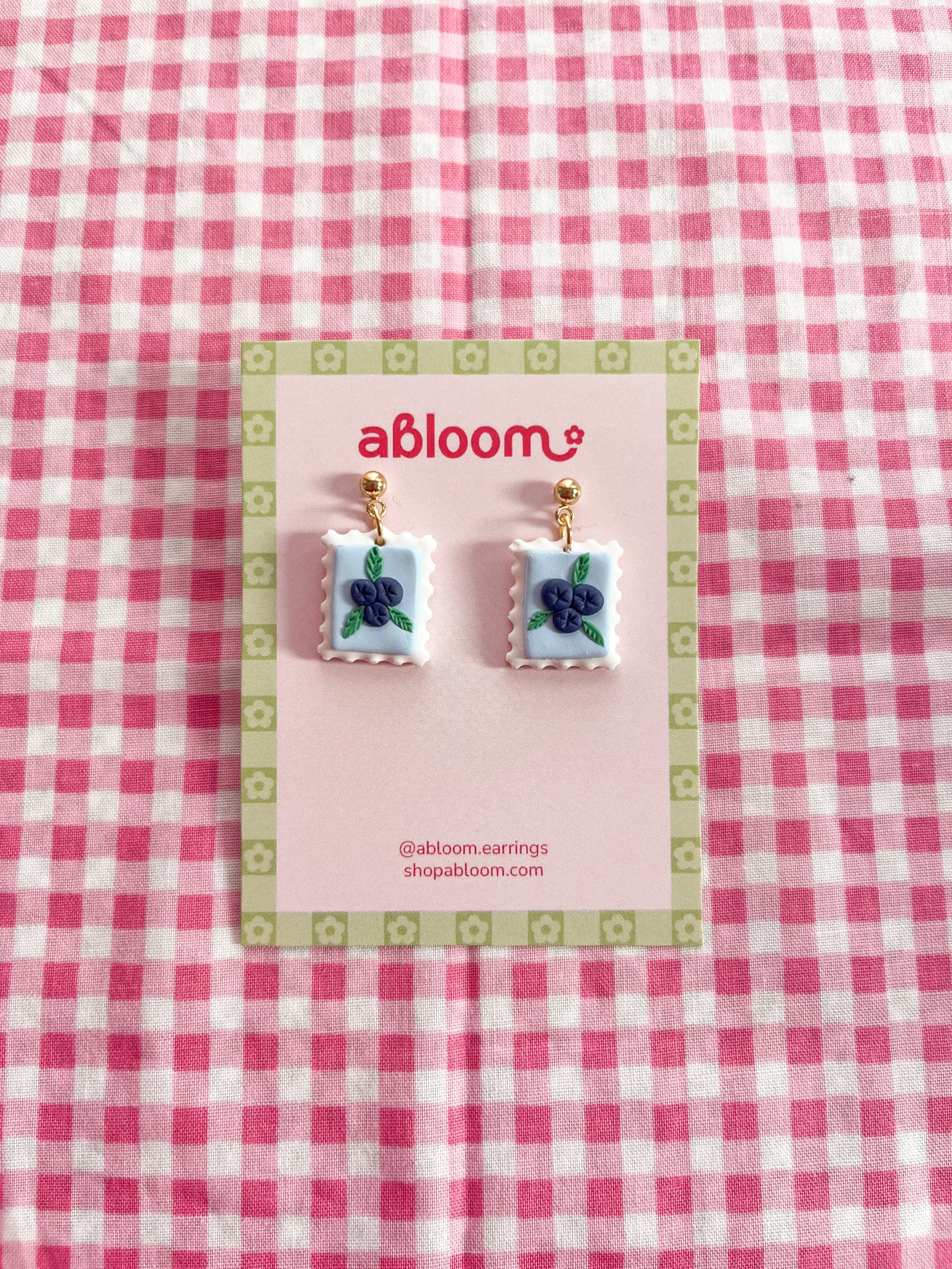 Cute whimsical fruit postage stamp earrings handmade from polymer clay