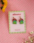 frogs wearing mushroom hat earrings