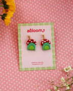 frogs wearing mushroom hat earrings