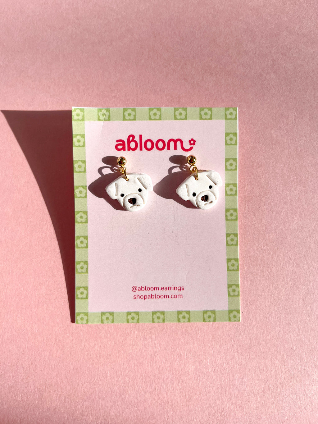 Cute handmade dog earrings made from polymer clay