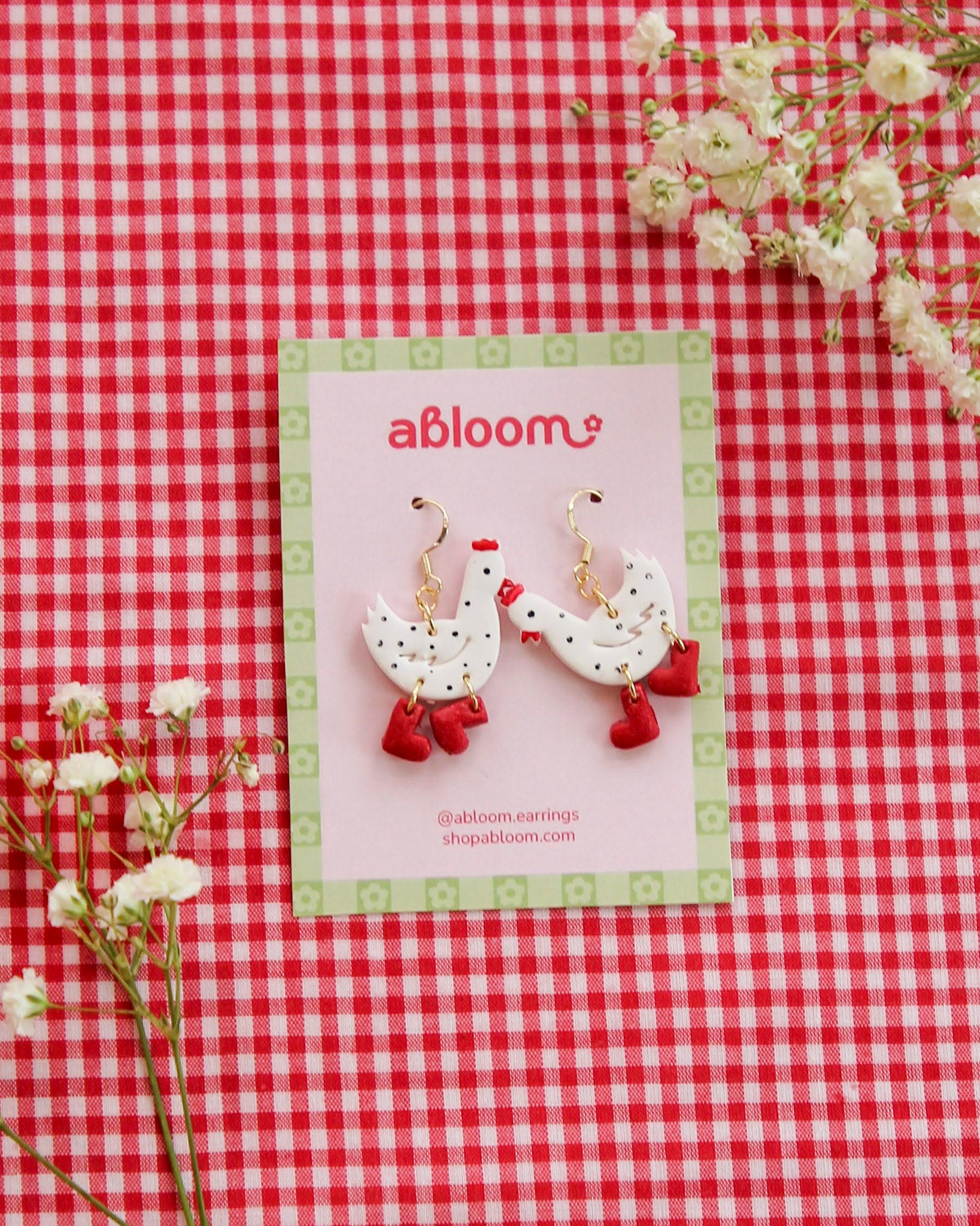 chickens wearing rainboots earrings