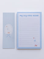 notepad and bookmark set with a goose design on a light blue background