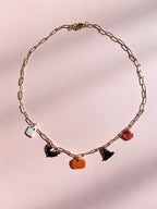 necklace with pumpkin, witch hat, bat, ghost, and maple leaf chams