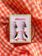 goosed dressed up in a witch costume, handmade polymer clay earrings