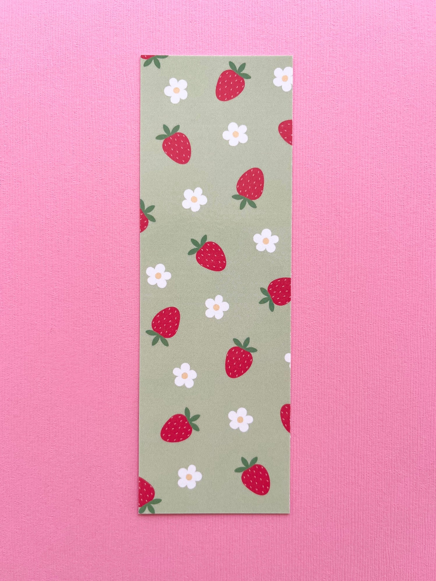 bookmark with strawberry and flower pattern on a pink background
