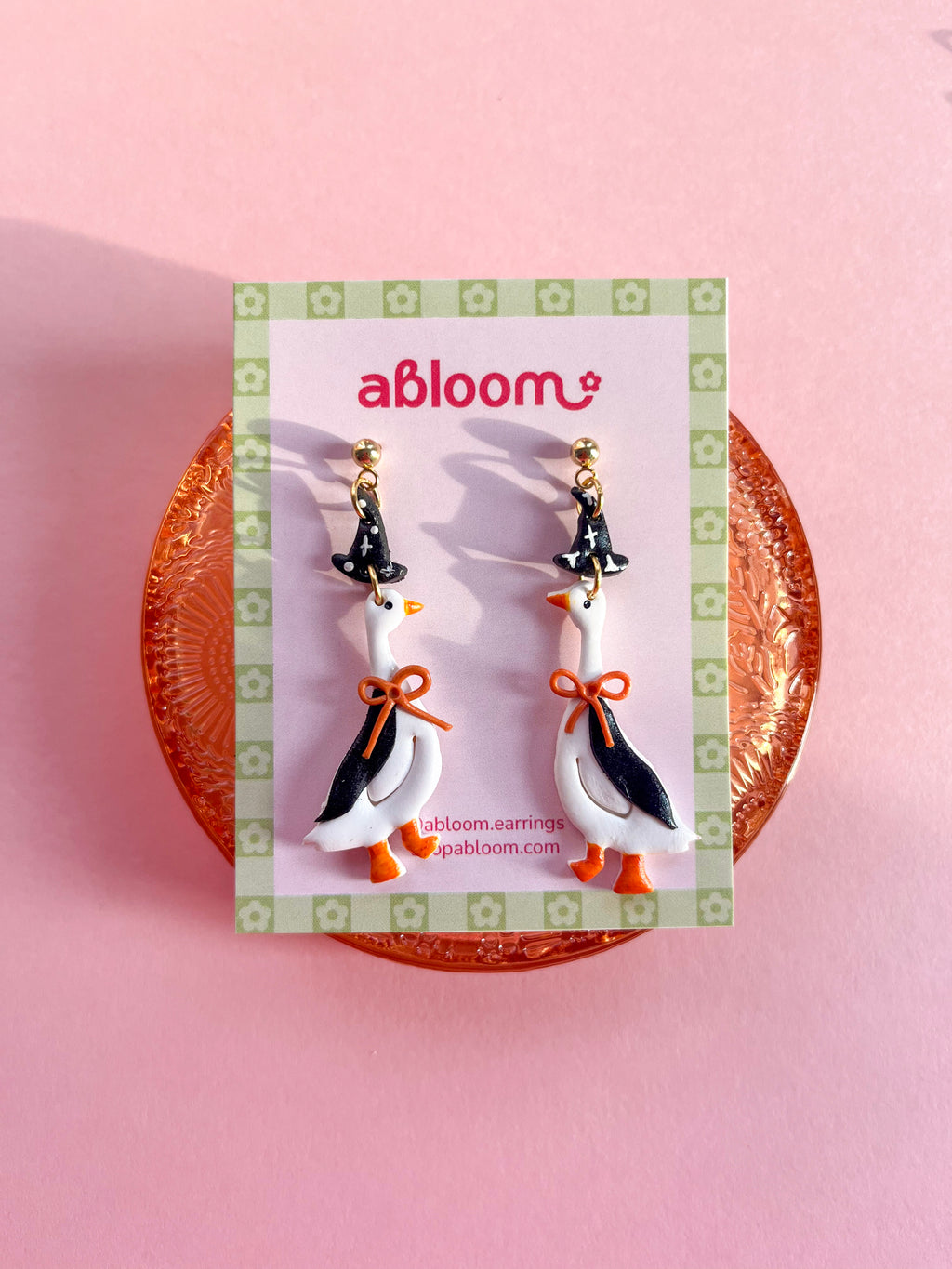 goosed dressed up in a witch costume, handmade polymer clay earrings