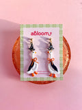 goosed dressed up in a witch costume, handmade polymer clay earrings