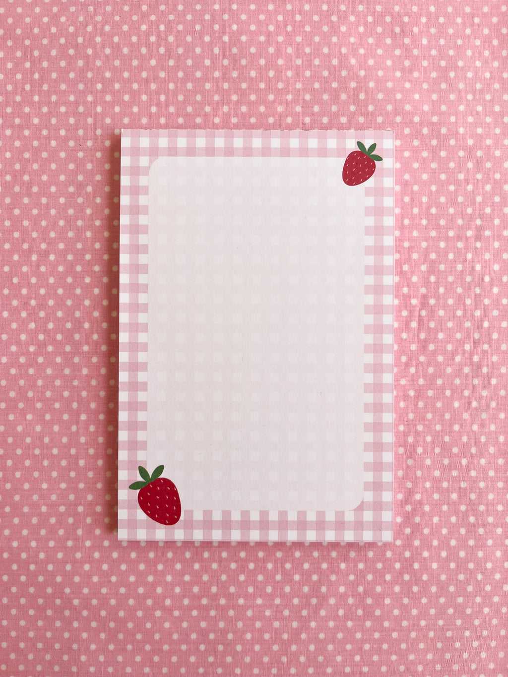 Notepad with strawberry design and gingham border