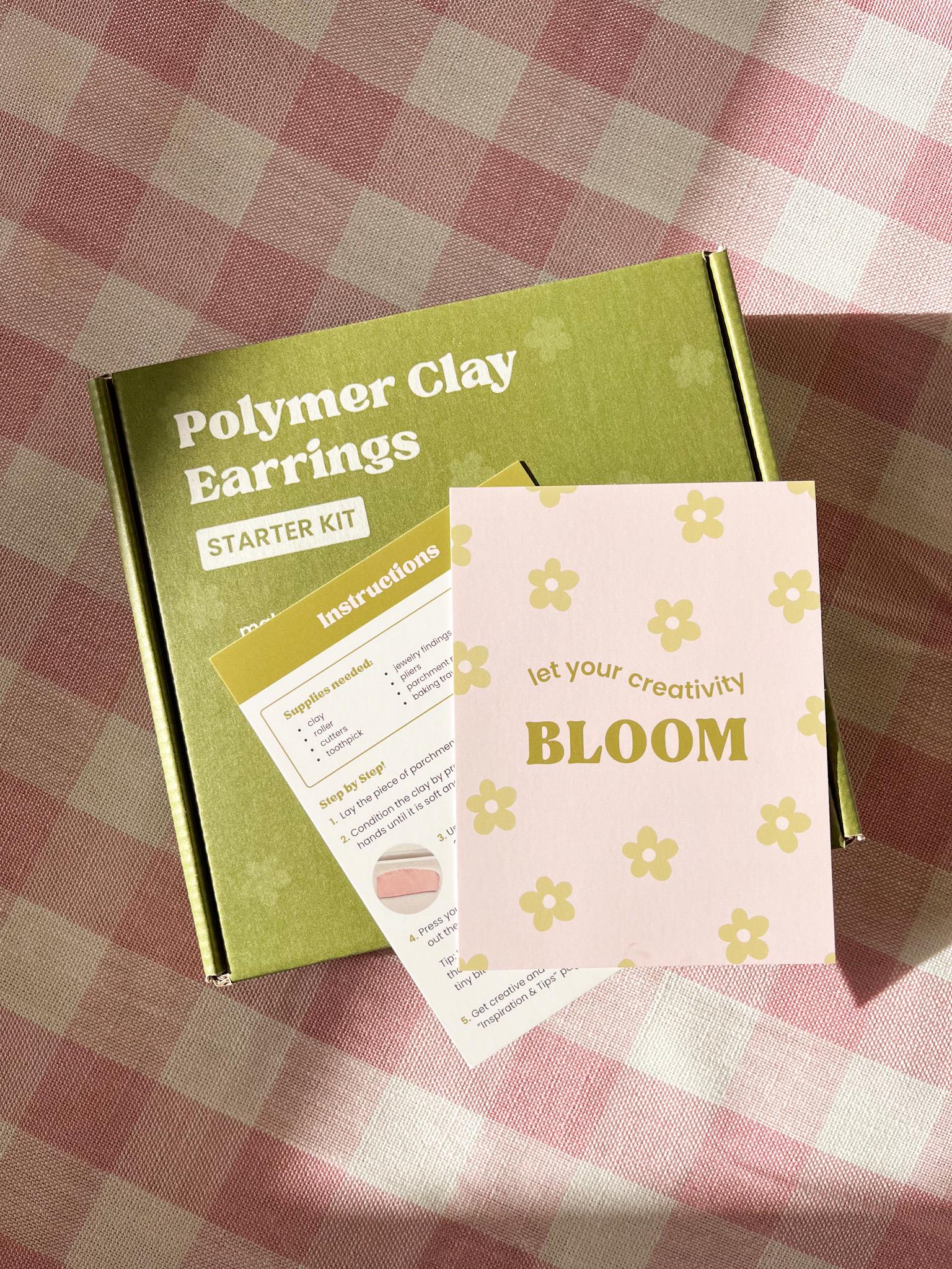Polymer clay earrings starter kit with instructions on a checkered tablecloth