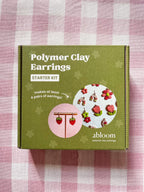Box of Polymer Clay Earrings Starter Kit by abloom on a checkered fabric background